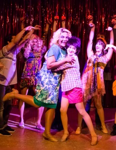 Pictured: Darryl V. Jones* as Bernadette, Nicole Thordsen as Shirley, and the Company in PRISCILLA, QUEEN OF THE DESERT, directed by John Fisher. A Theatre Rhinoceros Production at the Eureka Theatre, Photo by David Wilson. *Member Actors Equity Association