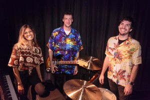 Pictured L to R: The Band - Sheela Ramesh, Conductor/Pianist; Nick Martin, Guitar; David Walker, Drums in THE BOY FROM OZ, directed by John Fisher; a Theatre Rhinoceros Production at The Gateway Theatre. Photo by David Wilson.