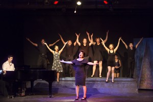 Pictured L to R: Justin Genna* as Peter Allen, Kim Larsen as Dick, Larissa Kelloway as Marion, Justin Lopez as Greg, Leandra Ramm as Judy Garland, John-Thomas Hanson as Mark, SuzyJane Edwards as Dee, Grace Chen as Rockie, Carol Ann Walker as Liza Minnelli and John Charles Quimpo as Chris in THE BOY FROM OZ, directed by John Fisher; a Theatre Rhinoceros Production at The Gateway Theatre. Photo by David Wilson.
