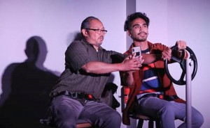 (L to R) Alan S. Quismorio (as Arnel) and Earl Paus (Danny) in DRIVEN, by Boni Alvarez. A production by Theatre Rhinoceros at Spark Arts, running through November 17.