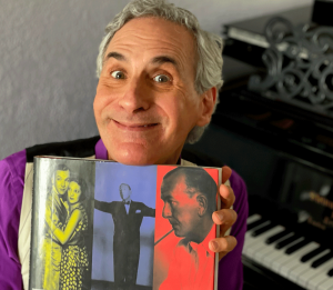 Mark Nadler Holding a photo book